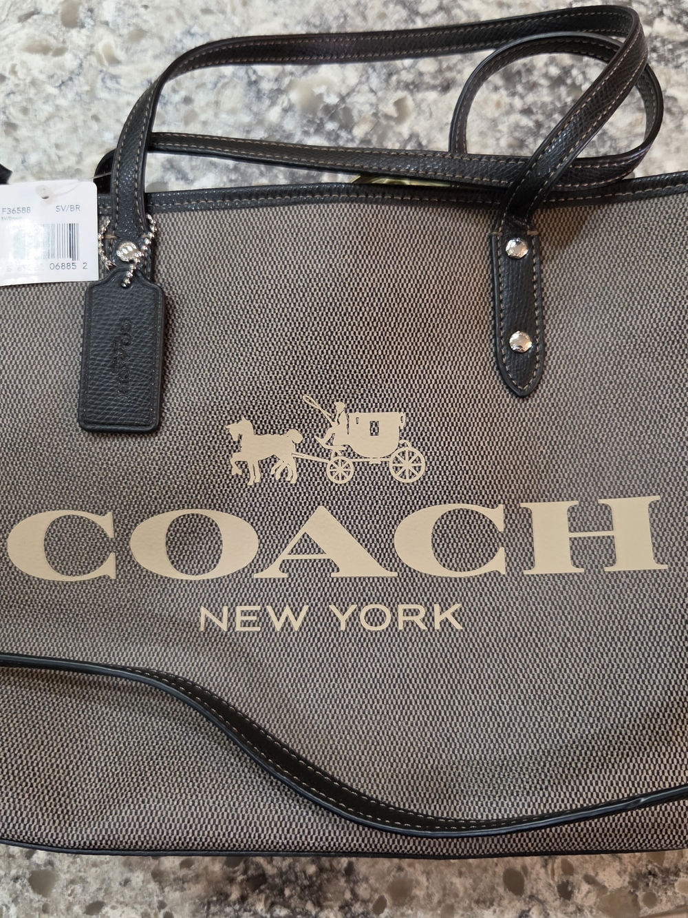 COACH New York Women’s Beige Canvas Tote with Black Trim